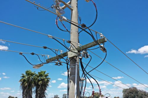 An image of a power pole taken with a drone